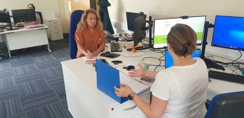 Staff providing funding advice