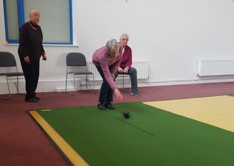 One individual participating in bowls.