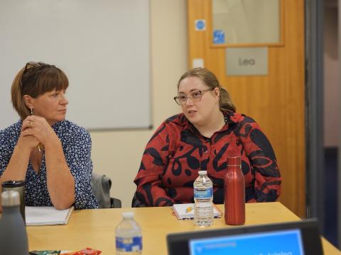 A photo taken at a training session featuring two people.