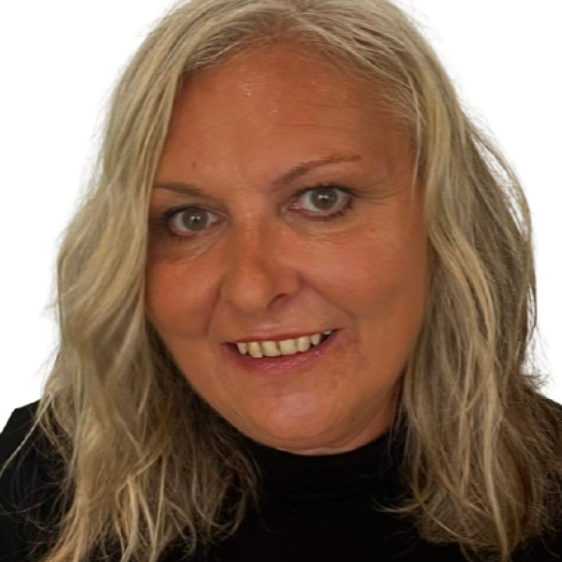 Photograph of a woman with shoulder length blonde hair. She is wearing a black top